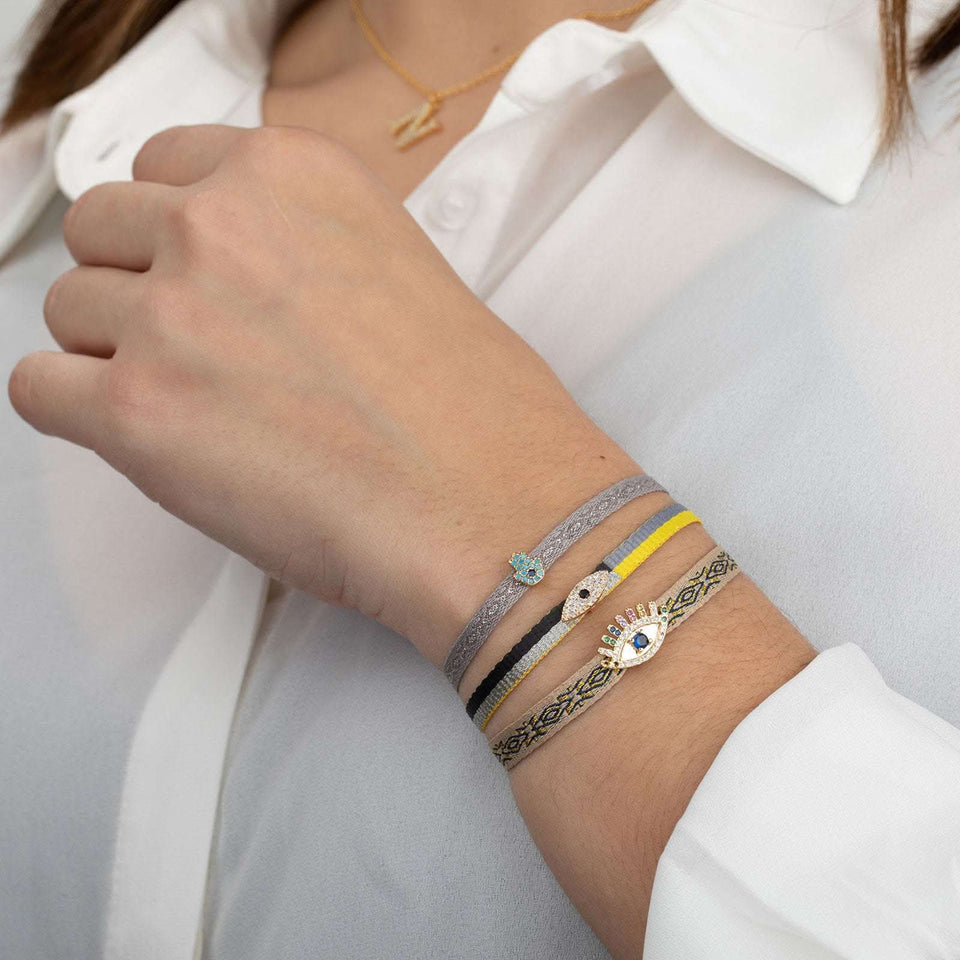 Pulsera Protectora Ojo Turco en Cinta Bronce Baño Oro Ajustable